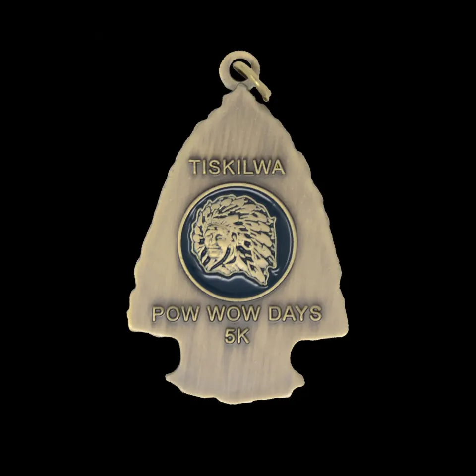 Tiskilwa Pow Wow Days 5K arrowhead-shaped race medal