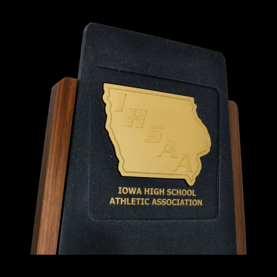 Iowa High School Athletic Association gold state outline on a black presentation plaque