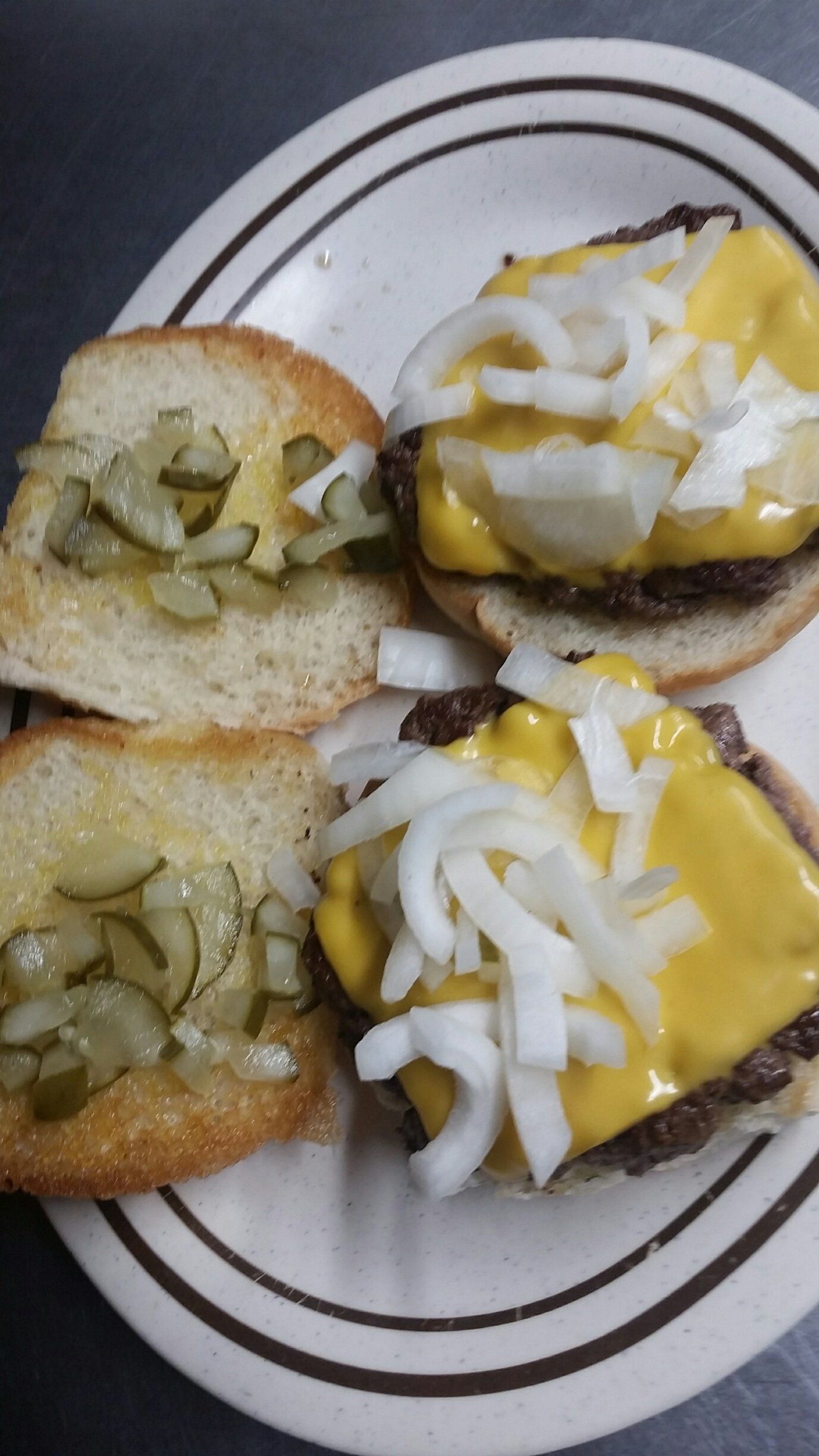 Cheeseburger and french fries served at 9th Street Pub in La Salle, IL